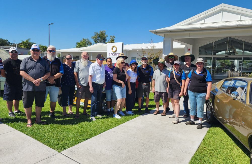 Group photo outside Arcare Warners Bay 2025